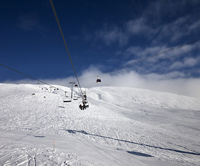 Image showing Gondola and chair lift at ski resort in nice day