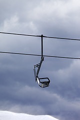 Image showing Chair lift at gray windy day