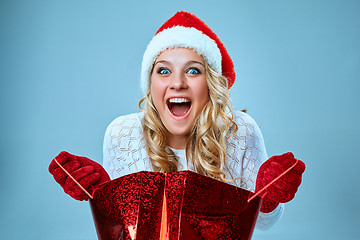 Image showing Beautiful young woman in Santa Claus clothes