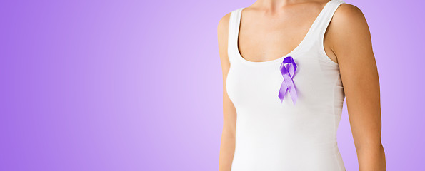 Image showing close up of woman with purple awareness ribbon