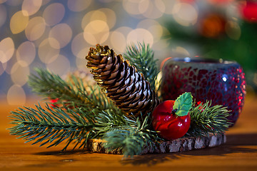 Image showing christmas fir branch decoration and candle lantern