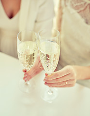 Image showing close up of lesbian couple with champagne glasses