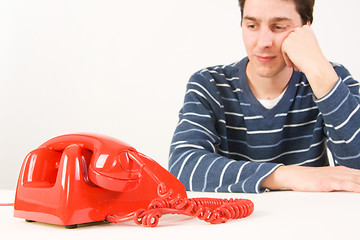 Image showing man waiting for a call