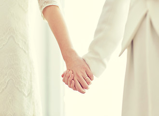 Image showing close up of happy married lesbian couple hugging