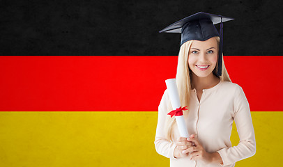 Image showing happy student girl in bachelor cap with diploma