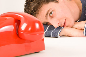 Image showing man waiting for a call