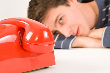 Image showing man waiting for a call