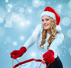 Image showing Beautiful young woman in Santa Claus clothes