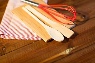 Image showing close up of cooking kitchenware on wooden board