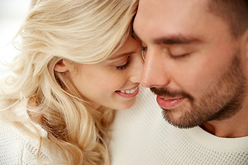 Image showing close up of happy couple faces with closed eyes