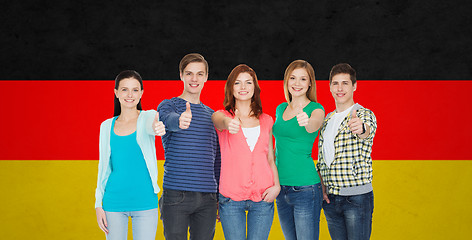 Image showing group of smiling students showing thumbs up