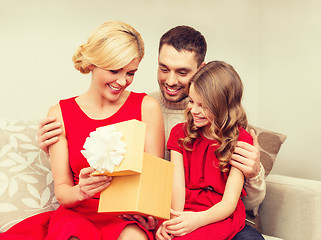 Image showing happy family opening gift box