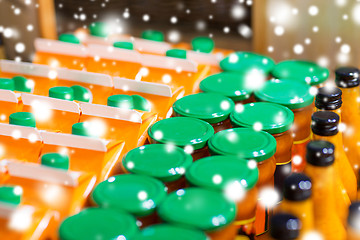 Image showing jars and bottles with eco food at bio market