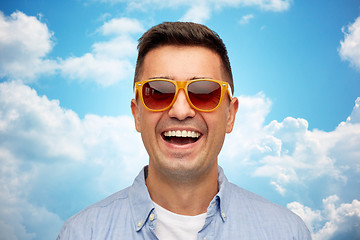 Image showing face of smiling man in shirt and sunglasses