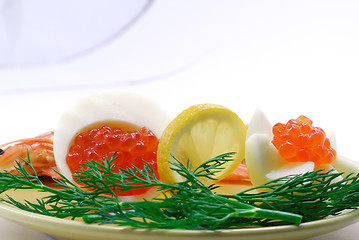 Image showing Red salmon caviar and cooked shrimps