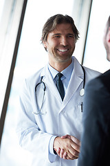 Image showing doctor handshake with a patient