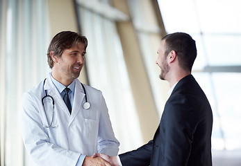 Image showing doctor handshake with a patient