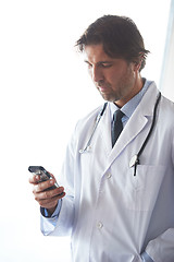 Image showing doctor speaking on cellphone