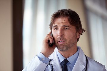 Image showing doctor speaking on cellphone