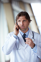 Image showing doctor speaking on cellphone