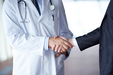 Image showing doctor handshake with a patient