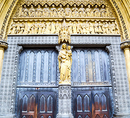 Image showing rose window weinstmister  abbey in london old church door and ma