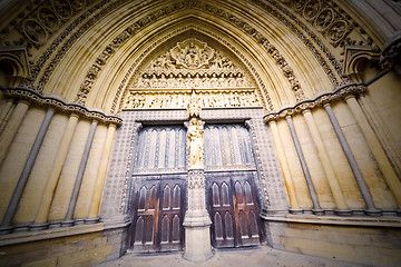 Image showing rose window weinstmister  abbey in london old church door and ma