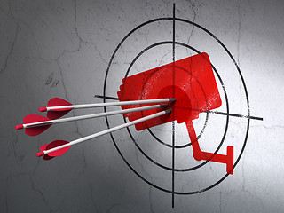 Image showing Protection concept: arrows in Cctv Camera target on wall background