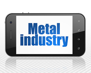 Image showing Manufacuring concept: Smartphone with Metal Industry on display