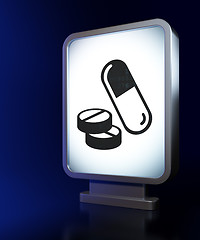 Image showing Healthcare concept: Pills on billboard background