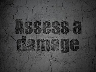 Image showing Insurance concept: Assess A Damage on grunge wall background