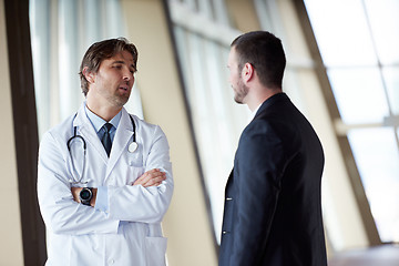 Image showing doctor handshake with a patient