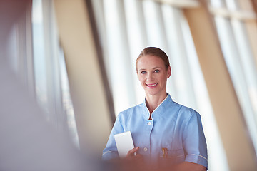 Image showing female doctor with tablet computer