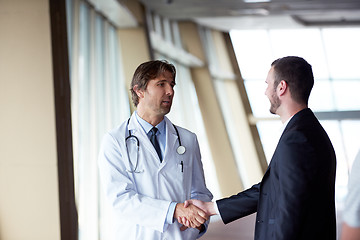 Image showing doctor handshake with a patient