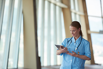 Image showing female doctor with tablet computer