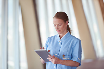 Image showing female doctor with tablet computer