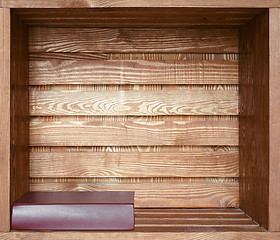 Image showing book on wooden shelf