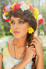 Image showing Beautiful girl in wreath of flowers
