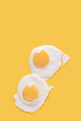 Image showing Fried eggs on yellow