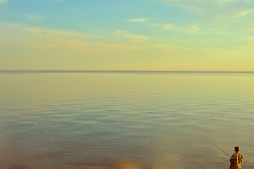 Image showing Fishing man at sunrise