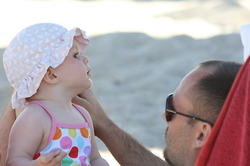 Image showing Father with baby daughter