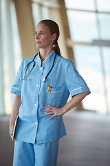 Image showing female doctor with tablet computer