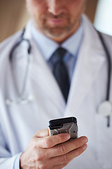 Image showing doctor speaking on cellphone