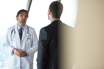 Image showing doctor handshake with a patient