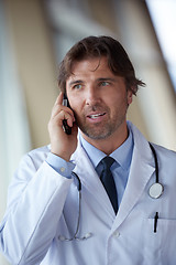 Image showing doctor speaking on cellphone