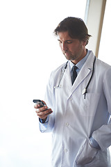 Image showing doctor speaking on cellphone