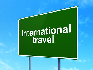 Image showing Vacation concept: International Travel on road sign background