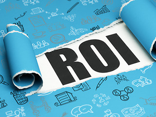 Image showing Business concept: black text ROI under the piece of  torn paper