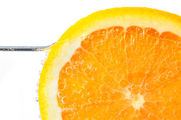 Image showing Orange slice in water