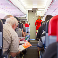 Image showing Passengers on the airplane.